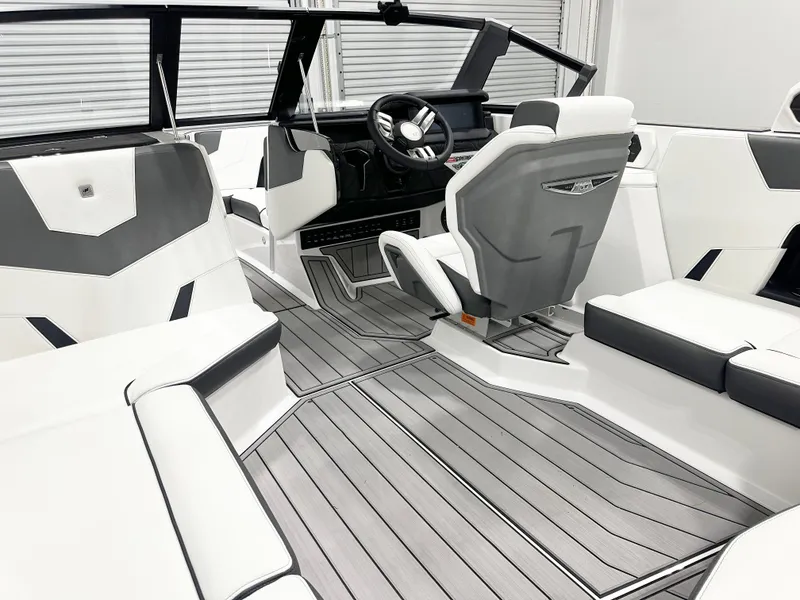 Slide: The Image of 2025 Nautique GS20 boat interior with sleek, modern design and comfortable seating. - 8