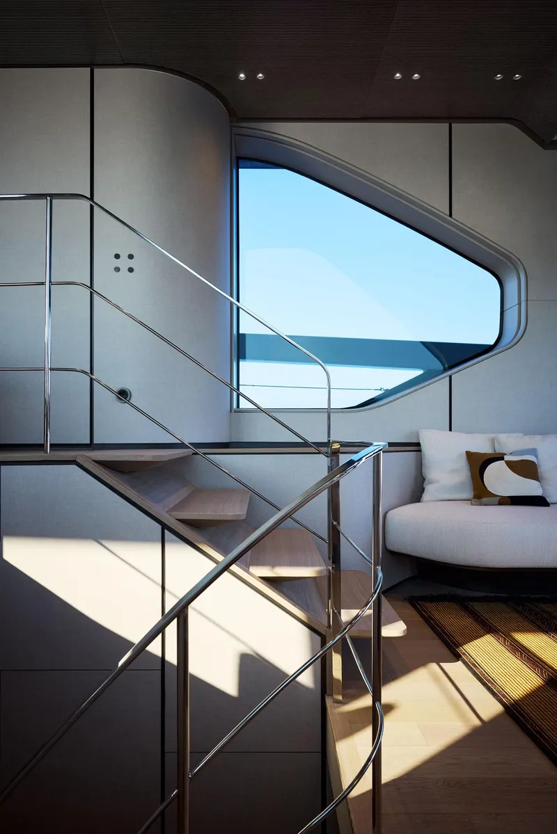 Slide: The Image of Modern interior of 2026 Sanlorenzo SP92 yacht with sleek staircase and large window. - 40