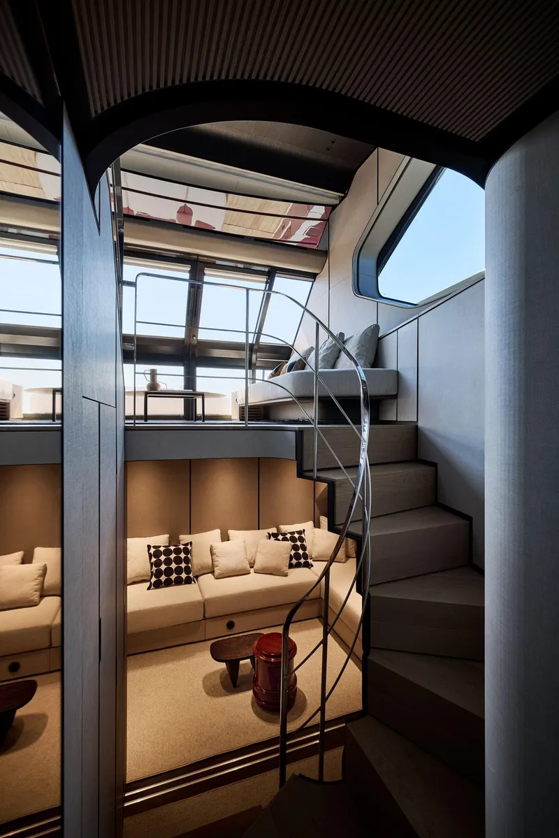 Slide: The Image of Luxurious interior of 2026 Sanlorenzo SP92 yacht with modern staircase and seating area. - 34