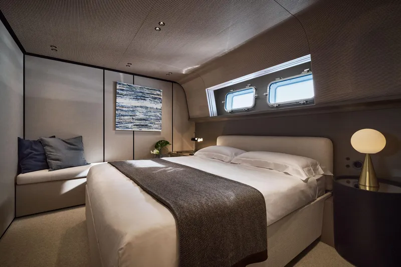 Slide: The Image of Luxurious Sanlorenzo SP92 2026 yacht bedroom with modern decor and large windows. - 39