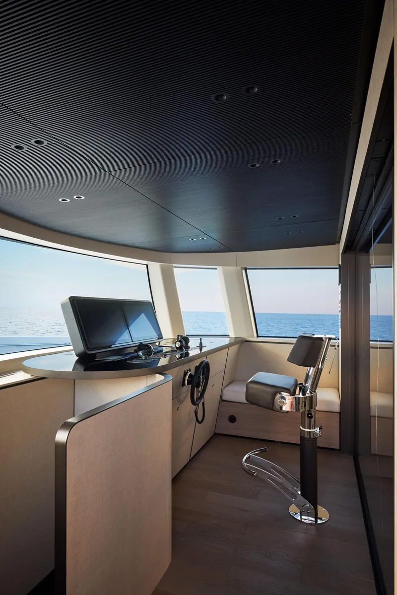 Slide: The Image of Interior of 2026 Sanlorenzo SP92 yacht with modern helm and ocean view. - 46