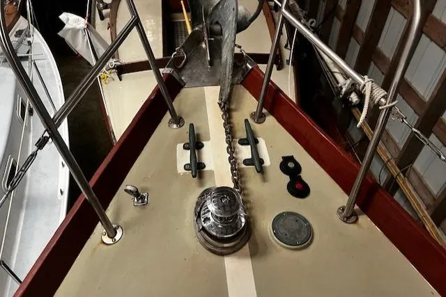 Slide: The Image of Bow of 1984 Sea Sprite 34 Yawl with anchor chain and deck fittings. - 11