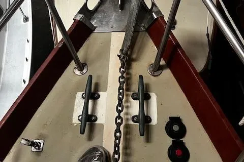 Slide: The Image of Bow of 1984 Sea Sprite 34 Yawl with anchor chain and cleats. - 12