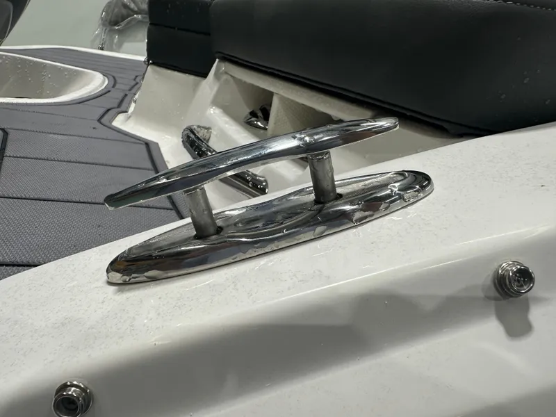Slide: The Image of 2024 Chaparral SSI21SP boat cleat on deck, close-up view. - 14