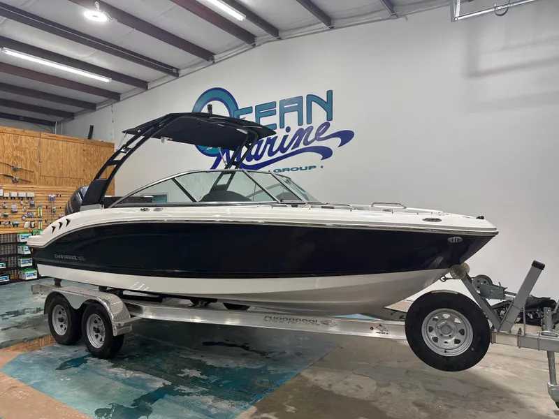 Slide: The Image of 2024 Chaparral SSI21SP boat on trailer in showroom. - 3