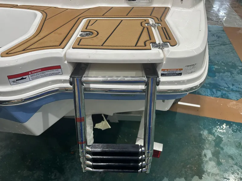 Slide: The Image of 2024 Chaparral SSI23SP boat swim platform with foldable ladder. - 15