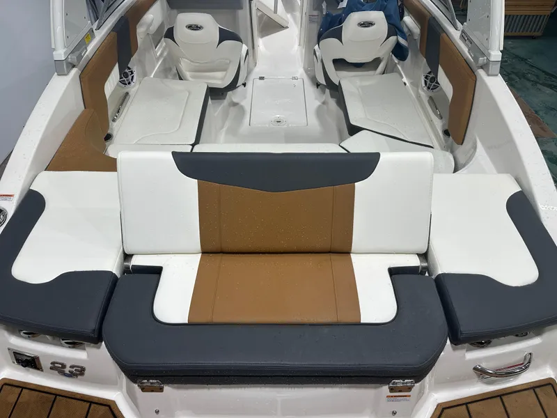 Slide: The Image of 2024 Chaparral SSI23SP boat interior with stylish seating and modern design. - 19