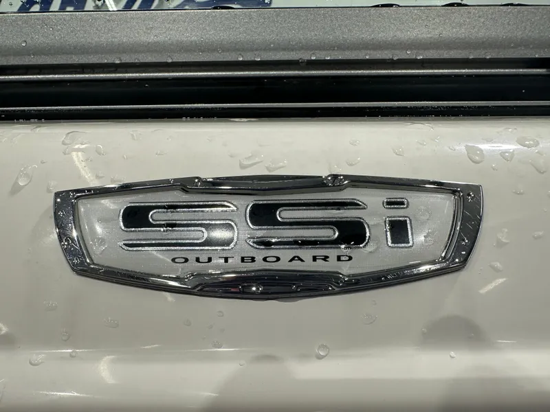 Slide: The Image of 2024 Chaparral SSI23SP outboard emblem with water droplets. - 9