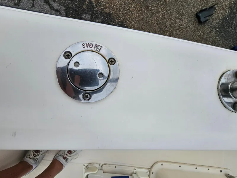 Slide: The Image of Gas cap on a 2005 Key West 2020CC boat, chrome finish. - 11