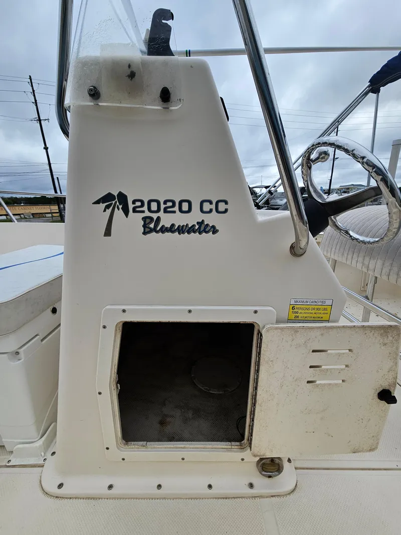 Slide: The Image of Key West 2020CC Bluewater boat console with open storage compartment, 2005 model. - 8