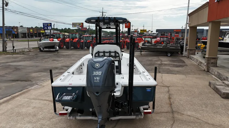 Slide: The Image of 2023 Tidewater 2410BM boat with Yamaha 300 V6 engine in dealership lot. - 17
