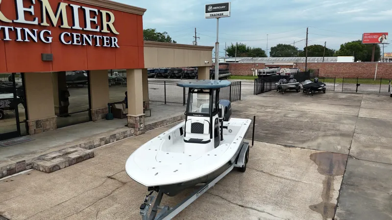 Slide: The Image of 2023 Tidewater 2410BM boat displayed at Premier Boating Center. - 8