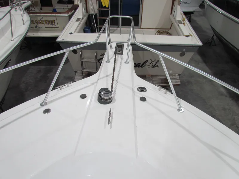 Slide: The Image of Bow view of 2000 Ocean Yachts 48 Sun Sport in a marina. - 11