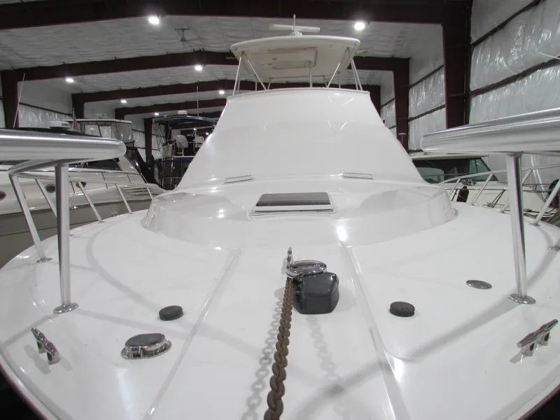 Slide: The Image of Ocean Yachts 48 Sun Sport 2000 model in indoor storage facility. - 17
