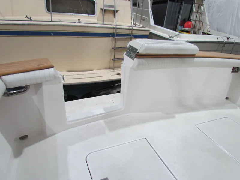 Slide: The Image of Ocean Yachts 48 Sun Sport 2000 model, white deck with wood accents, docked. - 20