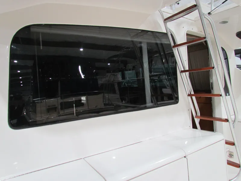 Slide: The Image of Ocean Yachts 48 Sun Sport 2000 model, featuring sleek design and modern amenities. - 30