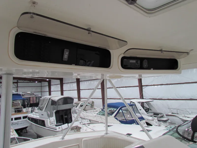 Slide: The Image of Interior view of 2000 Ocean Yachts 48 Sun Sport with overhead storage compartments. - 34