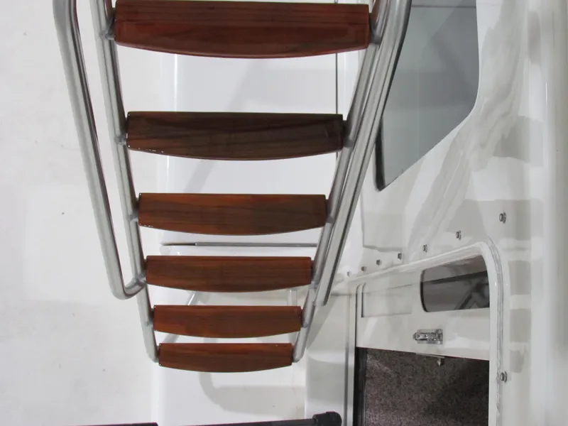 Slide: The Image of Wooden steps on Ocean Yachts 48 Sun Sport, 2000 model, with stainless steel railings. - 39