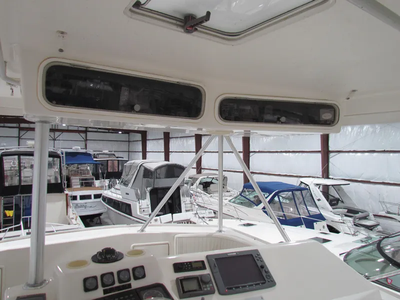 Slide: The Image of Interior view of 2000 Ocean Yachts 48 Sun Sport, showcasing helm and electronics. - 40