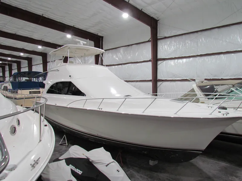 Slide: The Image of 2000 Ocean Yachts 48 Sun Sport in storage facility. - 6