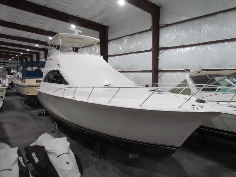 Slide: The Image of 2000 Ocean Yachts 48 Sun Sport in indoor storage facility. - 7