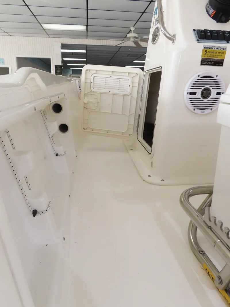 Slide: The Image of 2024 Key West 1720 Center Console interior with white finish and modern features. - 14
