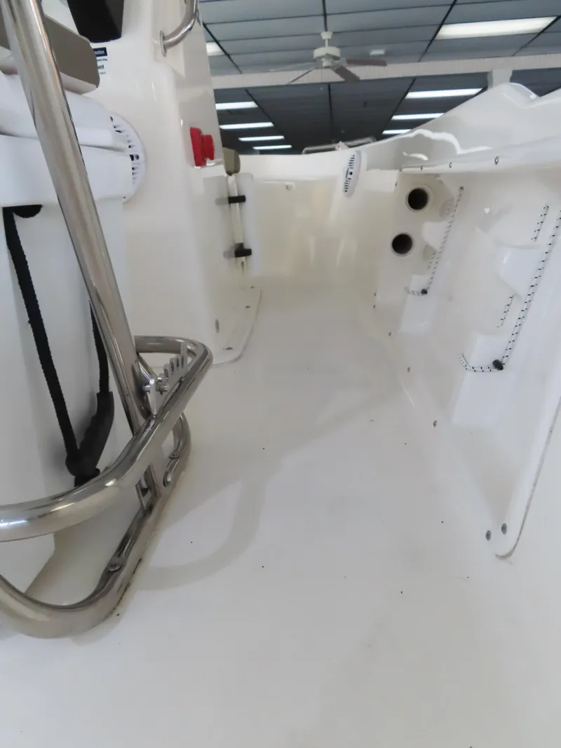 Slide: The Image of 2024 Key West 1720 Center Console boat interior with stainless steel railing. - 16