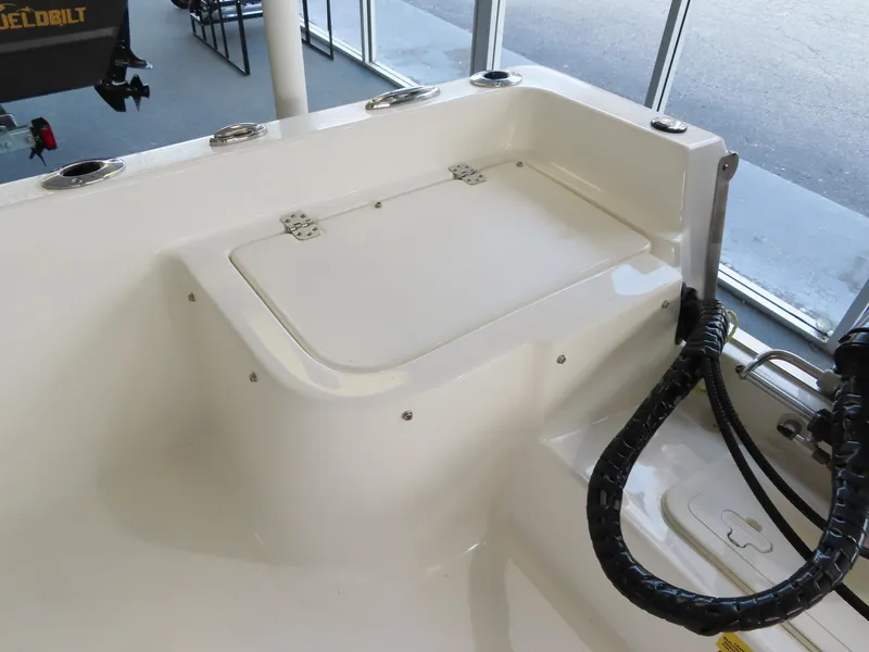 Slide: The Image of 2024 Key West 1720 Center Console boat interior with storage compartment. - 17