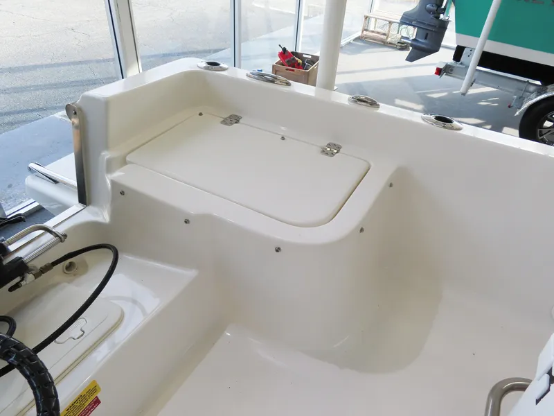 Slide: The Image of 2024 Key West 1720 Center Console boat interior with storage compartment. - 19