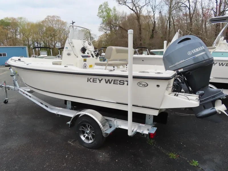 Slide: The Image of 2024 Key West 1720 Center Console boat on trailer with Yamaha outboard motor. - 2