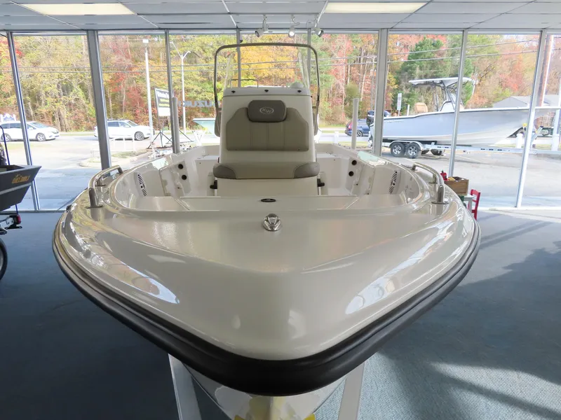 Slide: The Image of 2024 Key West 1720 Center Console boat displayed in showroom. - 5