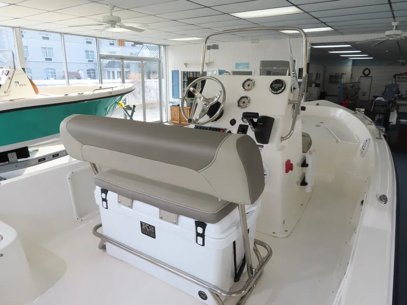 Slide: The Image of 2024 Key West 1720 Center Console boat interior with helm and seating. - 6