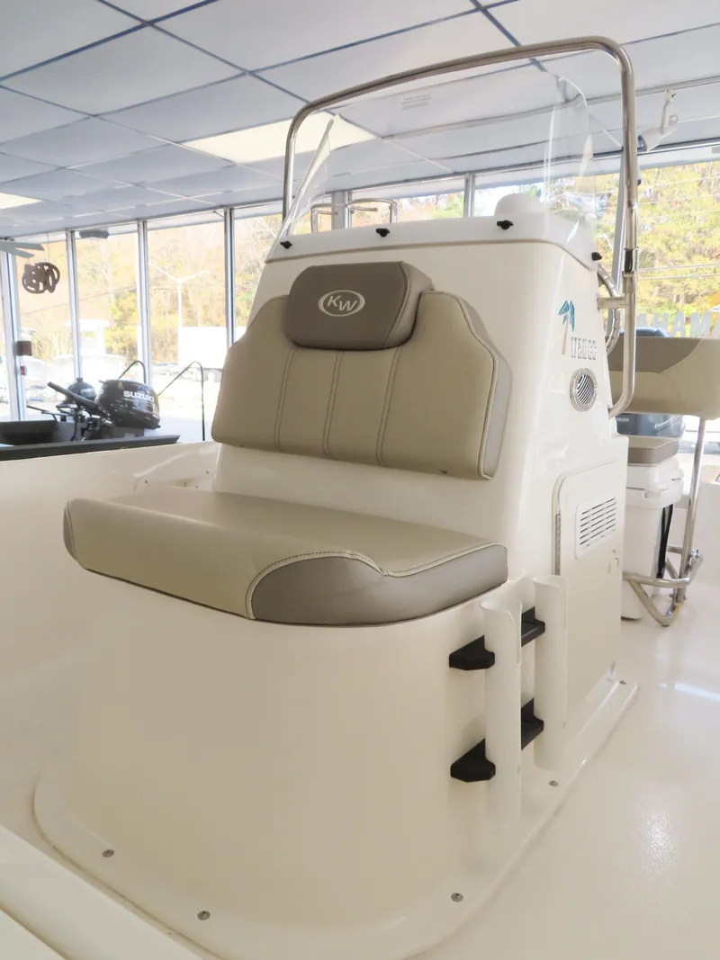 Slide: The Image of 2024 Key West 1720 Center Console boat interior with cushioned seating. - 9