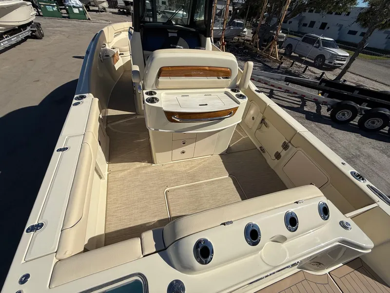 Slide: The Image of 2025 Chris-Craft Catalina 28 boat interior with seating and storage compartments. - 10