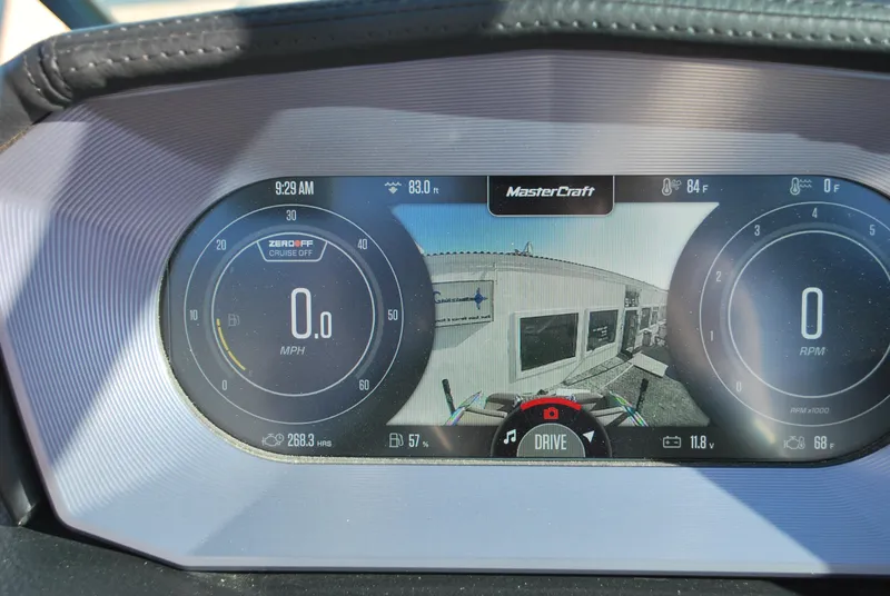 Slide: The Image of 2022 MasterCraft X24 dashboard display showing speed and RPM gauges. - 9