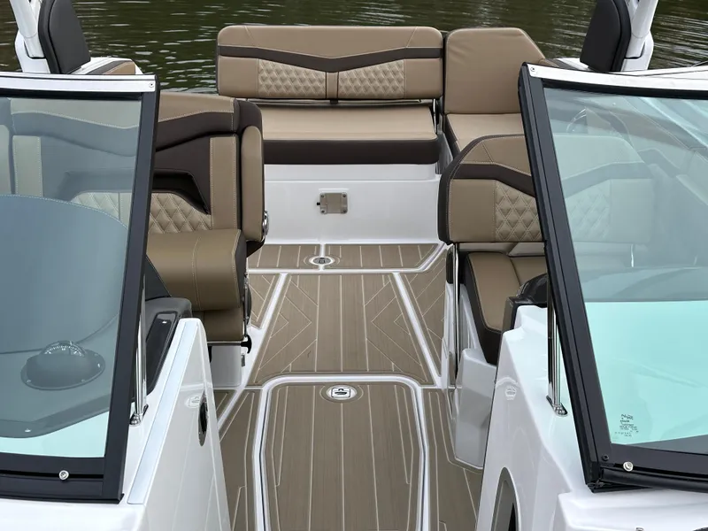 Slide: The Image of 2025 Monterey 258SS boat interior with luxurious seating and sleek design. - 20