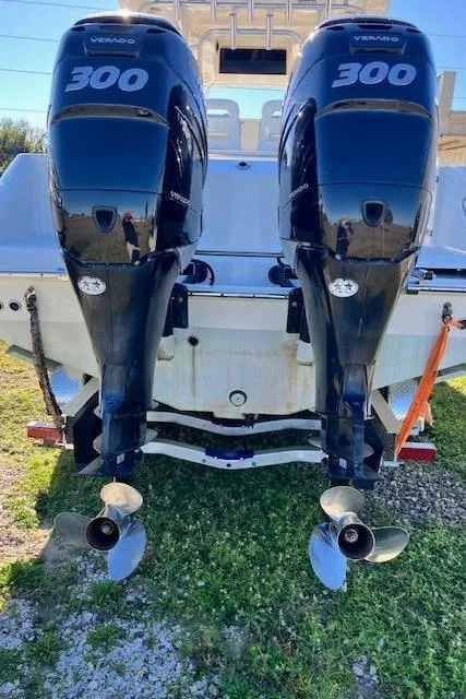 Slide: The Image of 2016 Boston Whaler 320 Outrage Cuddy Cabin with twin 300 Verado engines. - 12