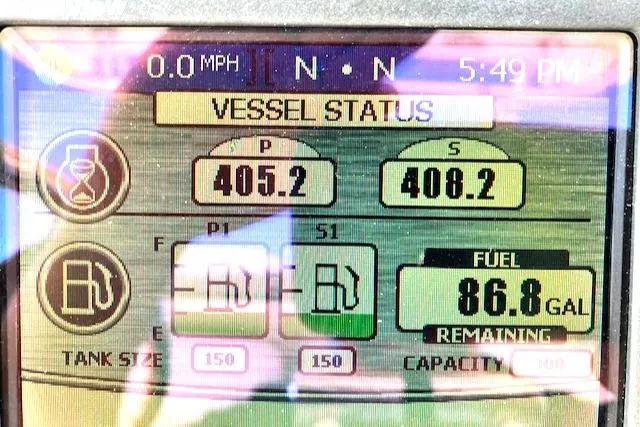 Slide: The Image of Vessel status display of 2016 Boston Whaler 320 Outrage, showing fuel and engine data. - 7