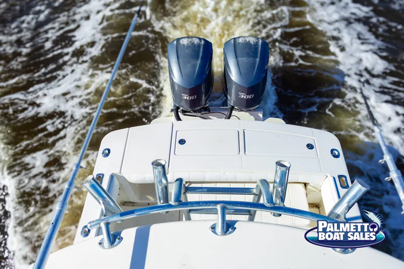 Slide: The Image of 2011 Regulator 28 boat with dual engines, viewed from above, on water. - 35