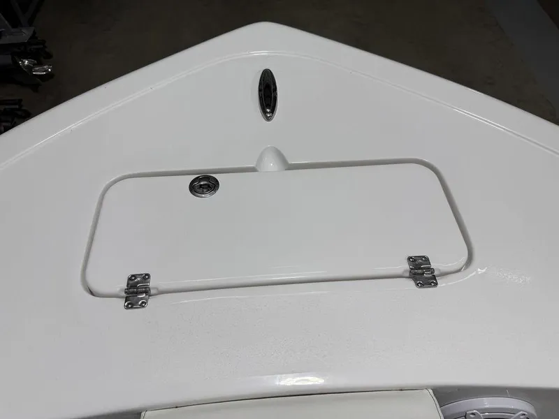 Slide: The Image of 2025 Tidewater 220 LXF boat deck with storage compartment and sleek design. - 19