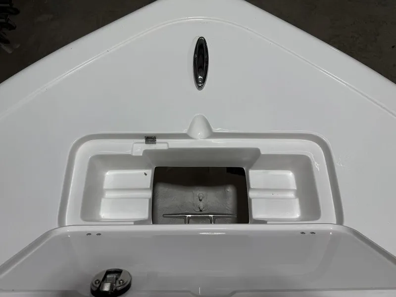 Slide: The Image of 2025 Tidewater 220 LXF boat bow with anchor storage compartment. - 24