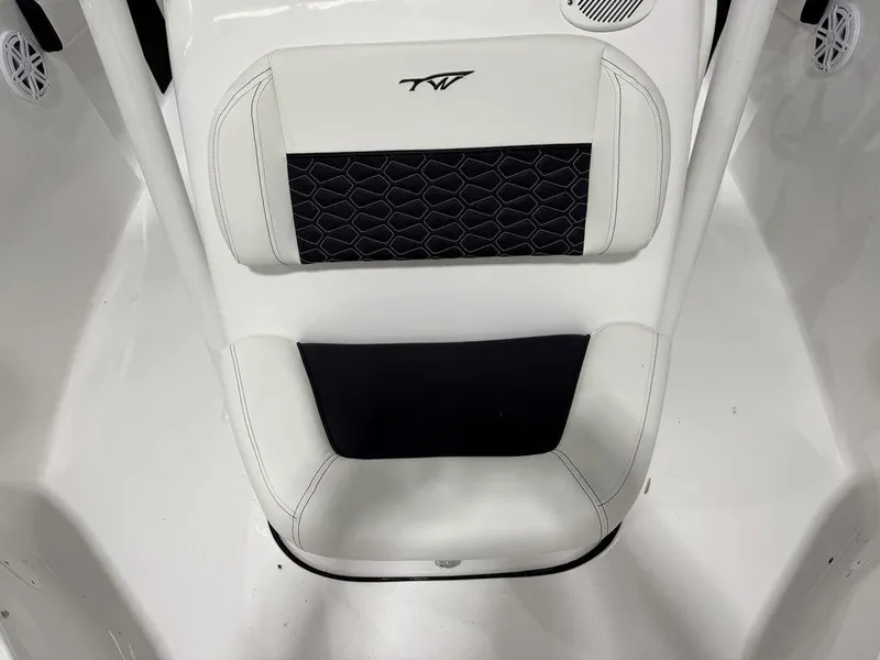 Slide: The Image of 2025 Tidewater 220 LXF boat seat with black and white upholstery. - 27