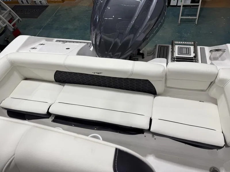 Slide: The Image of 2025 Tidewater 220 LXF boat interior with white seating and sleek design. - 30