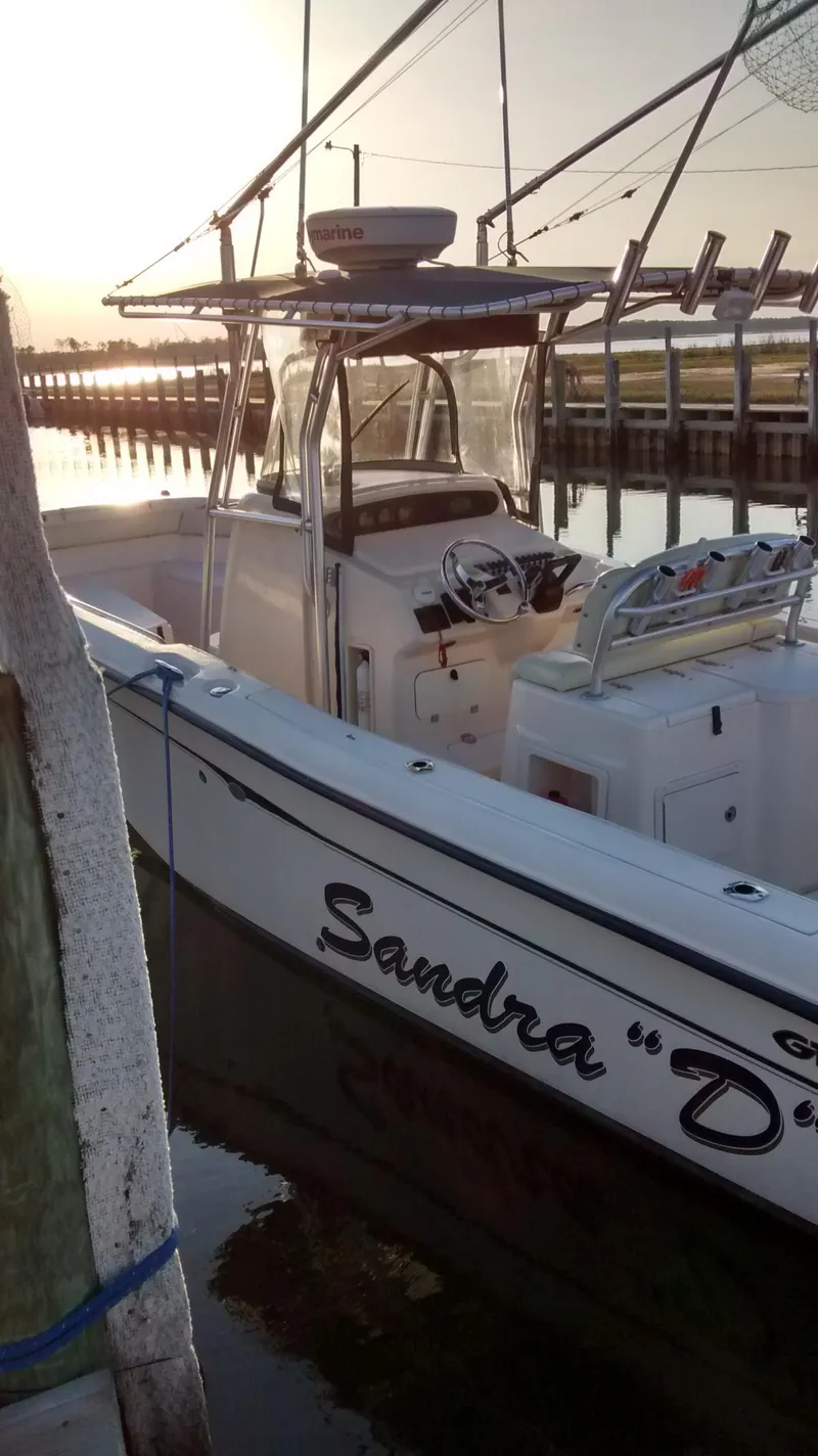 Slide: The Image of 2005 Grady-White Release 283 boat docked at sunset. - 2