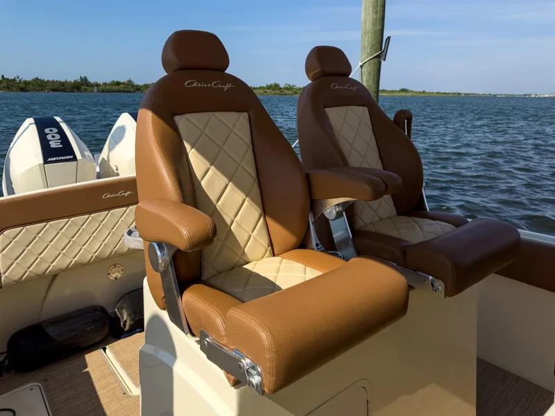 Slide: The Image of 2019 Chris-Craft 30 Catalina boat seats with luxurious brown and cream upholstery. - 22