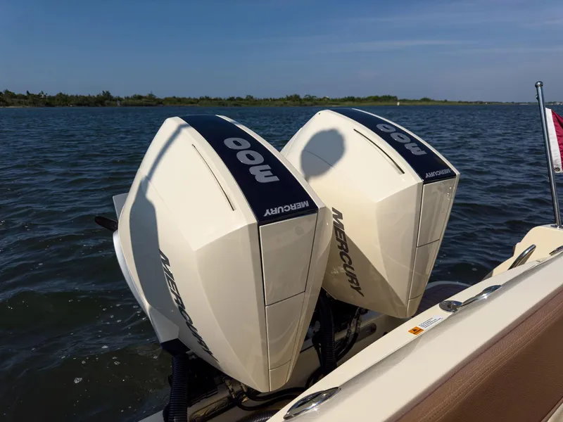 Slide: The Image of Twin Mercury 300 outboard engines on a 2019 Chris-Craft 30 Catalina boat. - 9