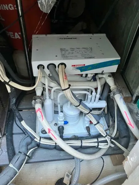 Slide: The Image of 1988 Wellcraft San Remo 43 boat plumbing system with Dometic components. - 18