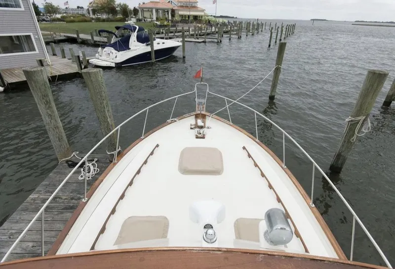 Slide: The Image of Bow view of 1978 Morton & Hersloff 36 docked at marina. - 5