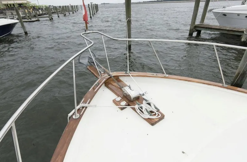 Slide: The Image of Bow of 1978 Morton & Hersloff 36 boat docked at marina. - 6