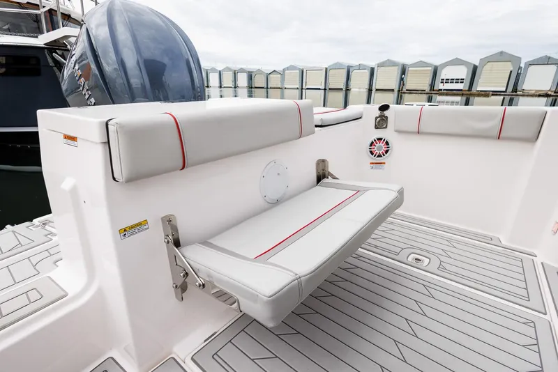 Slide: The Image of 2025 Solara S-250 Coupe boat interior with foldable seating and modern design. - 16
